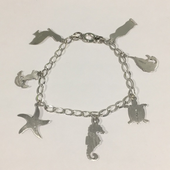 Sterling Silver Bracelet With 7 Different Charms - Picture 7 of 7